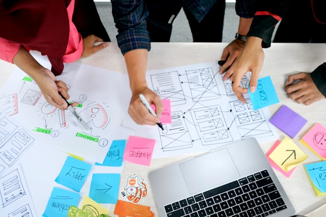 people working on design